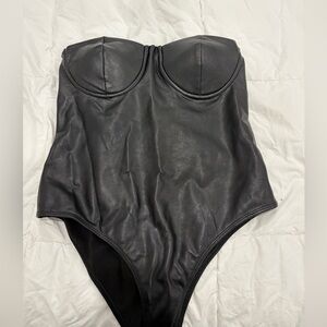Black leather corset bodysuit